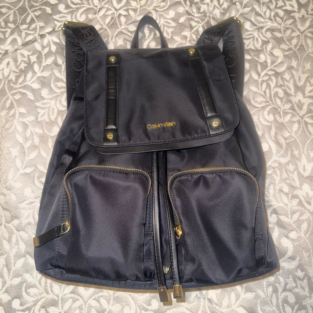 BRAND NEW!! Never used Calvin Klein black Backpack with Gold Details